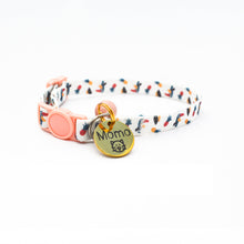 Load image into Gallery viewer, Nature design cat collar shown with engraved ID tag attached