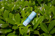 Load image into Gallery viewer, Drby All-Natural Paw Balm being applied to a dog's paw