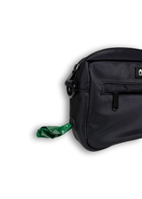 Load image into Gallery viewer, Built-in poop bag dispenser on crossbody dog walking bag
