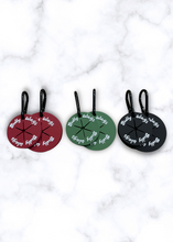 Load image into Gallery viewer, Poop bag clips in black, cherry wine, and cactus green
