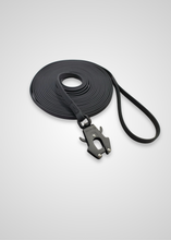 Load image into Gallery viewer, PVC long line leash in use for dog training
