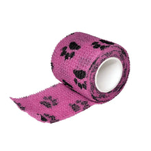 Load image into Gallery viewer, Cohesive bandage 2 inch vet wrap roll in pink with paw-print pattern
