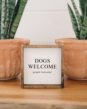 Load image into Gallery viewer, Close-up of the silk-screened "Dogs Welcome (People Tolerated)" lettering on the wood sign
