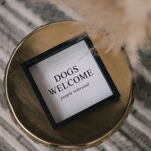 Load image into Gallery viewer, Back of the "Dogs Welcome (People Tolerated)" wood sign showing the keyhole hanger for flush hanging
