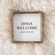 Load image into Gallery viewer, "Dogs Welcome (People Tolerated)" funny dog wood sign framed in stained pine — front view
