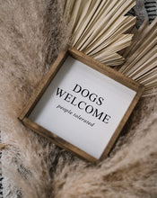 Load image into Gallery viewer, "Dogs Welcome (People Tolerated)" wood sign displayed as dog-lover wall decor
