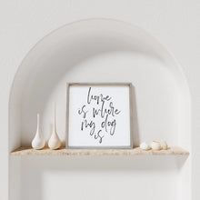 Load image into Gallery viewer, "Home Is Where My Dog Is" framed wood sign — angled view showing the frame depth
