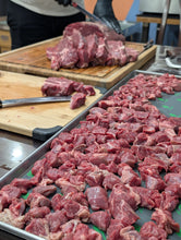 Load image into Gallery viewer, Dog being given a freeze-dried beef sirloin training treat
