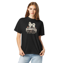 Load image into Gallery viewer, Woman wearing the Black Samoyed Fluff Monster T-shirt, showing the front chest design
