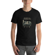 Load image into Gallery viewer, The Sofa Has a Seating Chart pet lover T-shirt in Black, front view on model showing the complete design.

