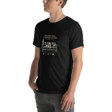 Load image into Gallery viewer, The Sofa Has a Seating Chart pet lover T-shirt in Black, angled front view showing print scale and fit.
